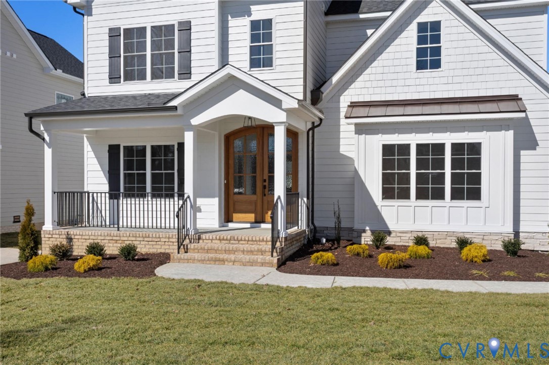 2831 Old Pump Road Henrico, VA 23233 - Photo 2 of 42 a view of a house with a swimming pool and porch