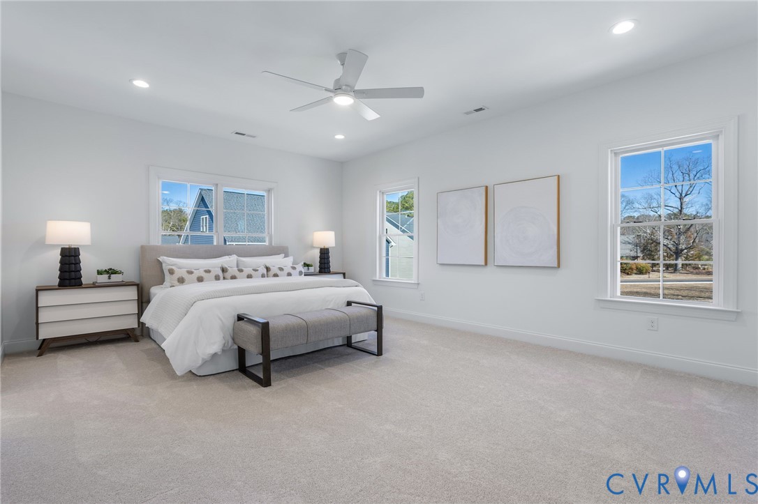 2831 Old Pump Road Henrico, VA 23233 - Photo 26 of 42 a spacious bedroom with a bed and a window