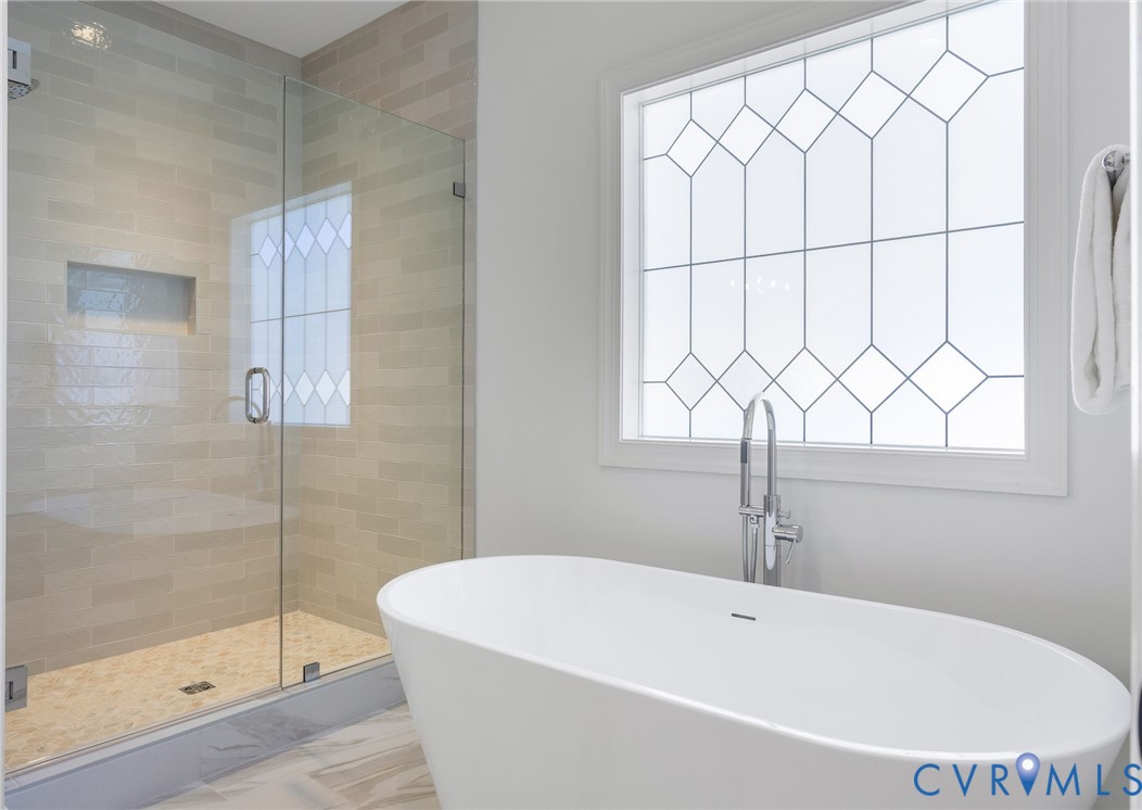 2831 Old Pump Road Henrico, VA 23233 - Photo 30 of 42 a white bath tub sitting next to a shower