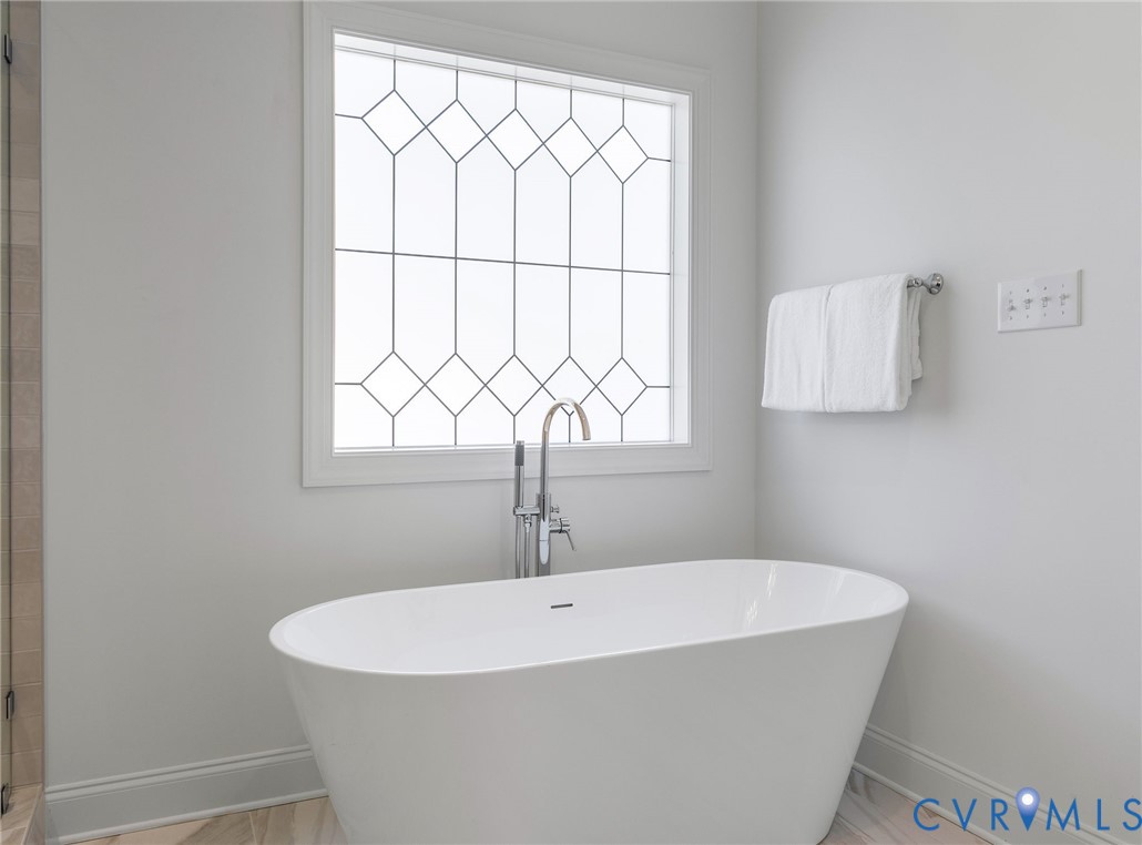 2831 Old Pump Road Henrico, VA 23233 - Photo 31 of 42 a white bath tub sitting next to a window