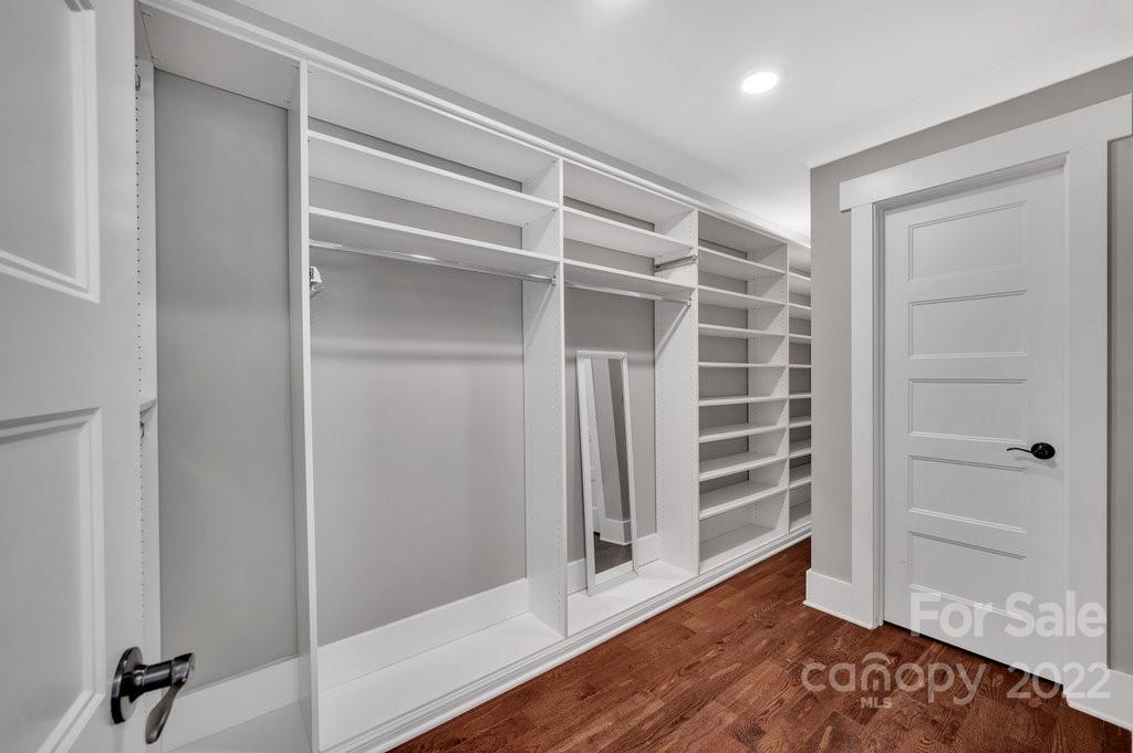 530 McAlway Road Charlotte, NC 28211 - Photo 19 of 36 a view of walk in closet with empty racks