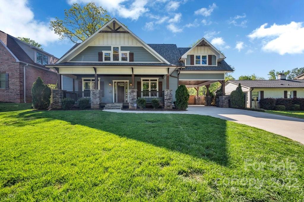 530 McAlway Road Charlotte, NC 28211 - Photo 2 of 36 a front view of a house with a yard and potted plants