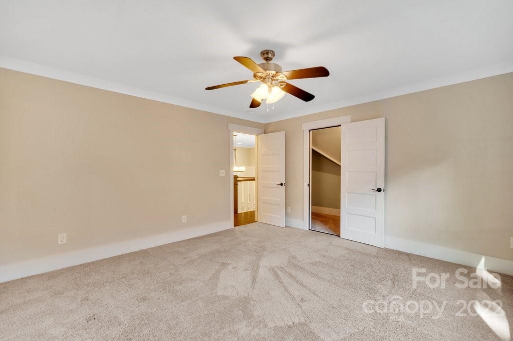 530 McAlway Road Charlotte, NC 28211 - Photo 26 of 36 a view of a big room with wooden floor and windows in a room