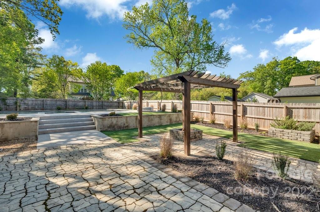 530 McAlway Road Charlotte, NC 28211 - Photo 33 of 36 a view of backyard with wooden fence