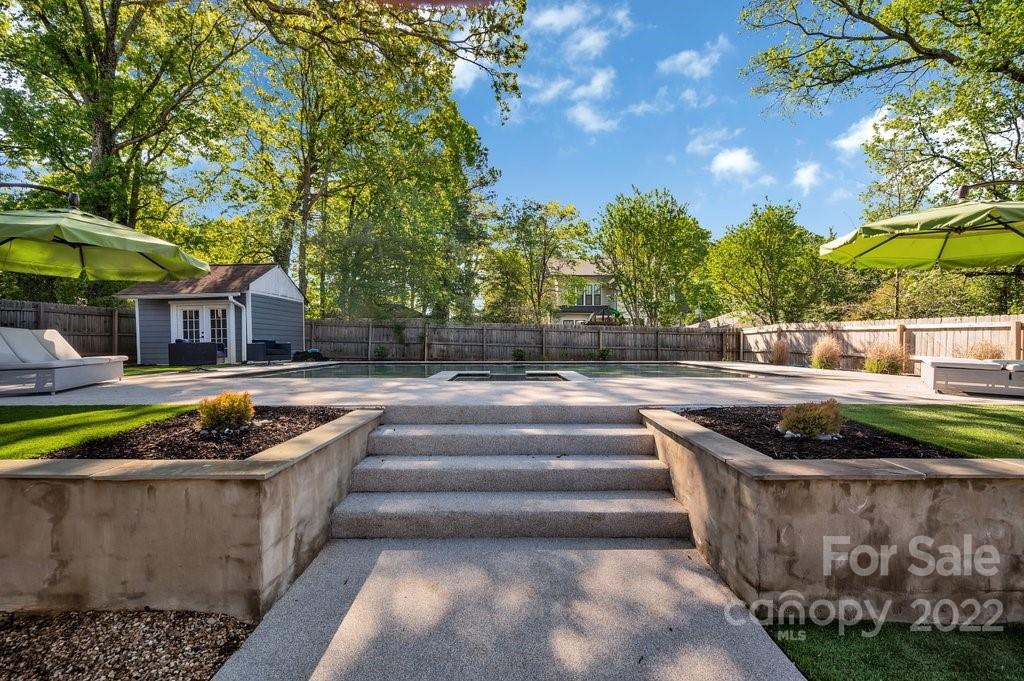 530 McAlway Road Charlotte, NC 28211 - Photo 34 of 36 a swimming pool with outdoor seating and yard