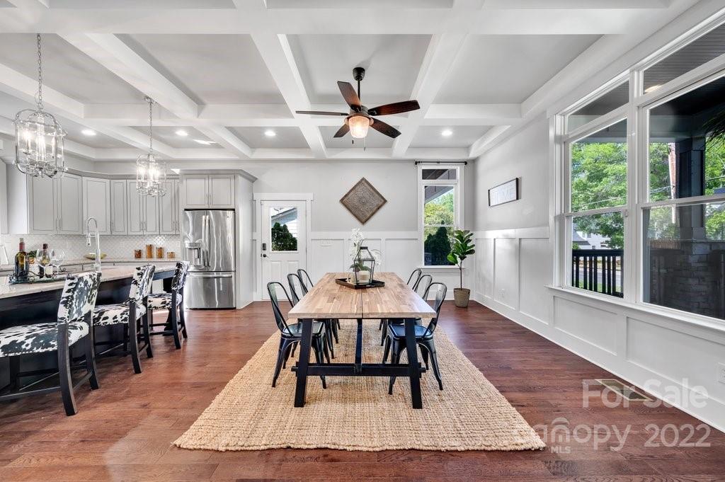 530 McAlway Road Charlotte, NC 28211 - Photo 4 of 36 a view of a dining room with furniture window and wooden floor
