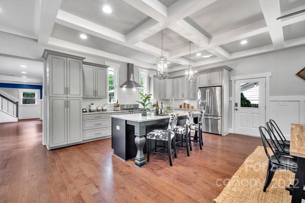 530 McAlway Road Charlotte, NC 28211 - Photo 5 of 36 a view of a dining room with furniture and wooden floor