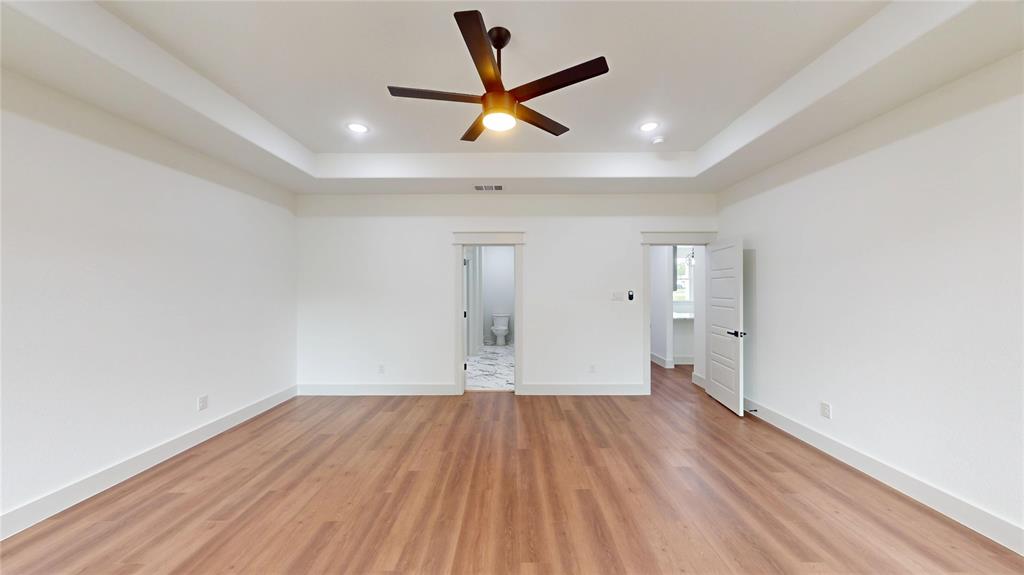 416 Linden Street Keene, TX 76059 - Photo 15 of 33 a view of empty room with wooden floor