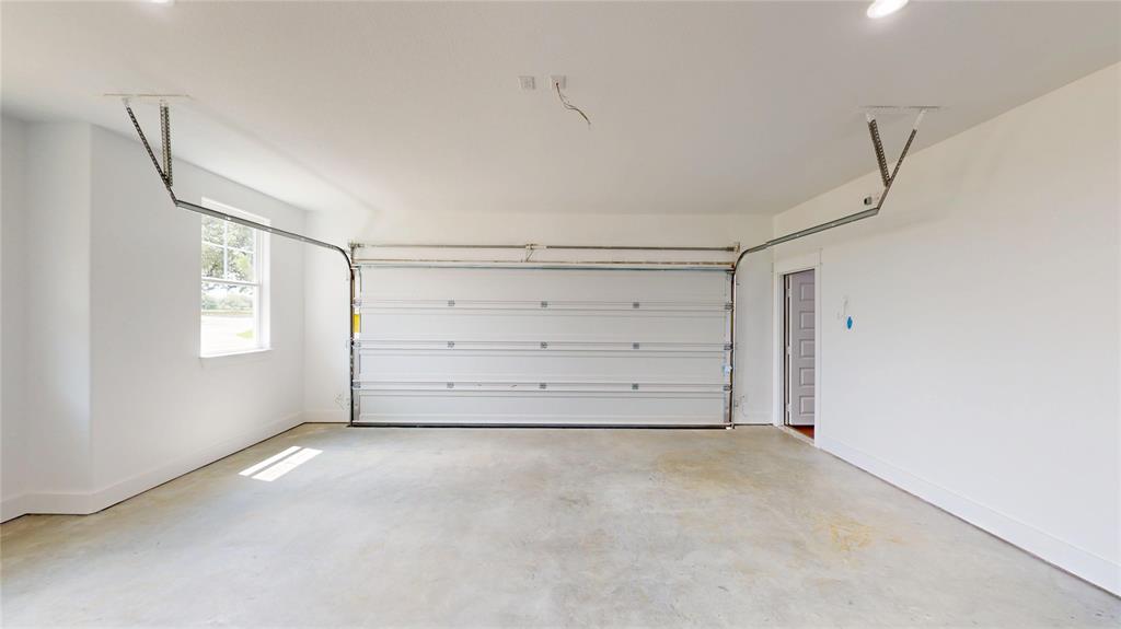 416 Linden Street Keene, TX 76059 - Photo 30 of 33 a view of an empty room with a window