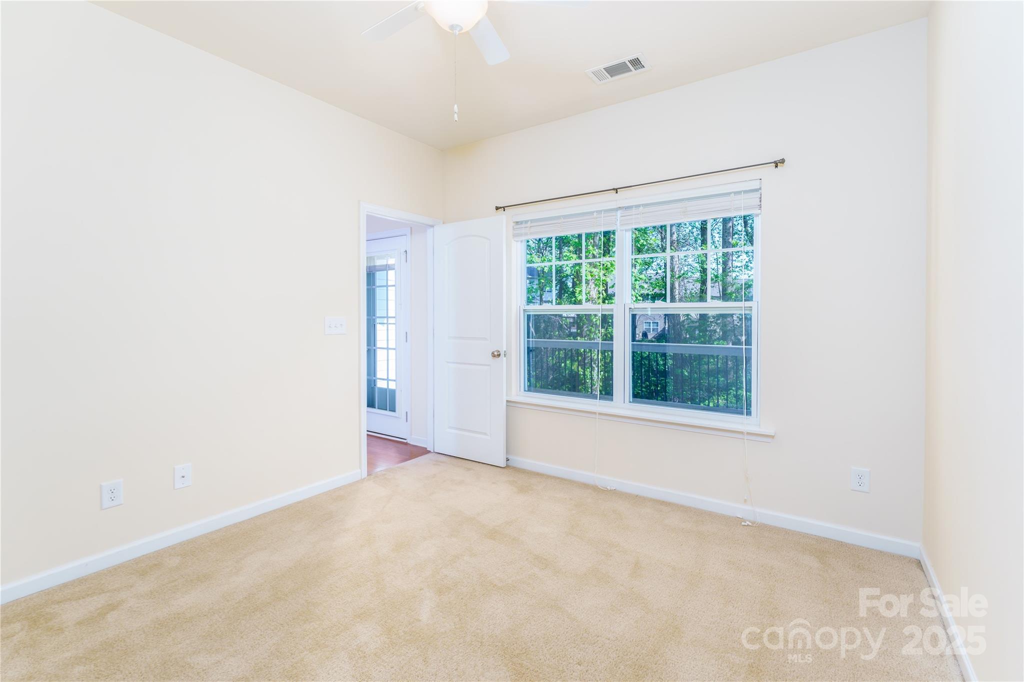 162 Limerick Road, Unit C Mooresville, NC 28115 - Photo 11 of 45 an empty room with windows