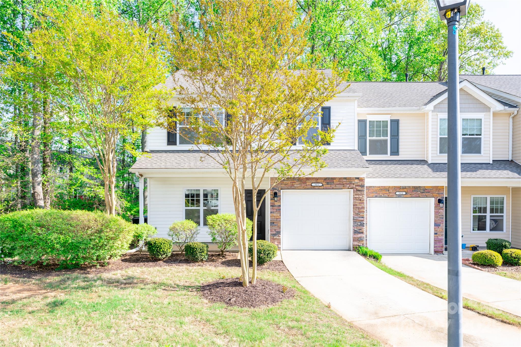 162 Limerick Road, Unit C Mooresville, NC 28115 - Photo 2 of 45 a view of front a house with a patio