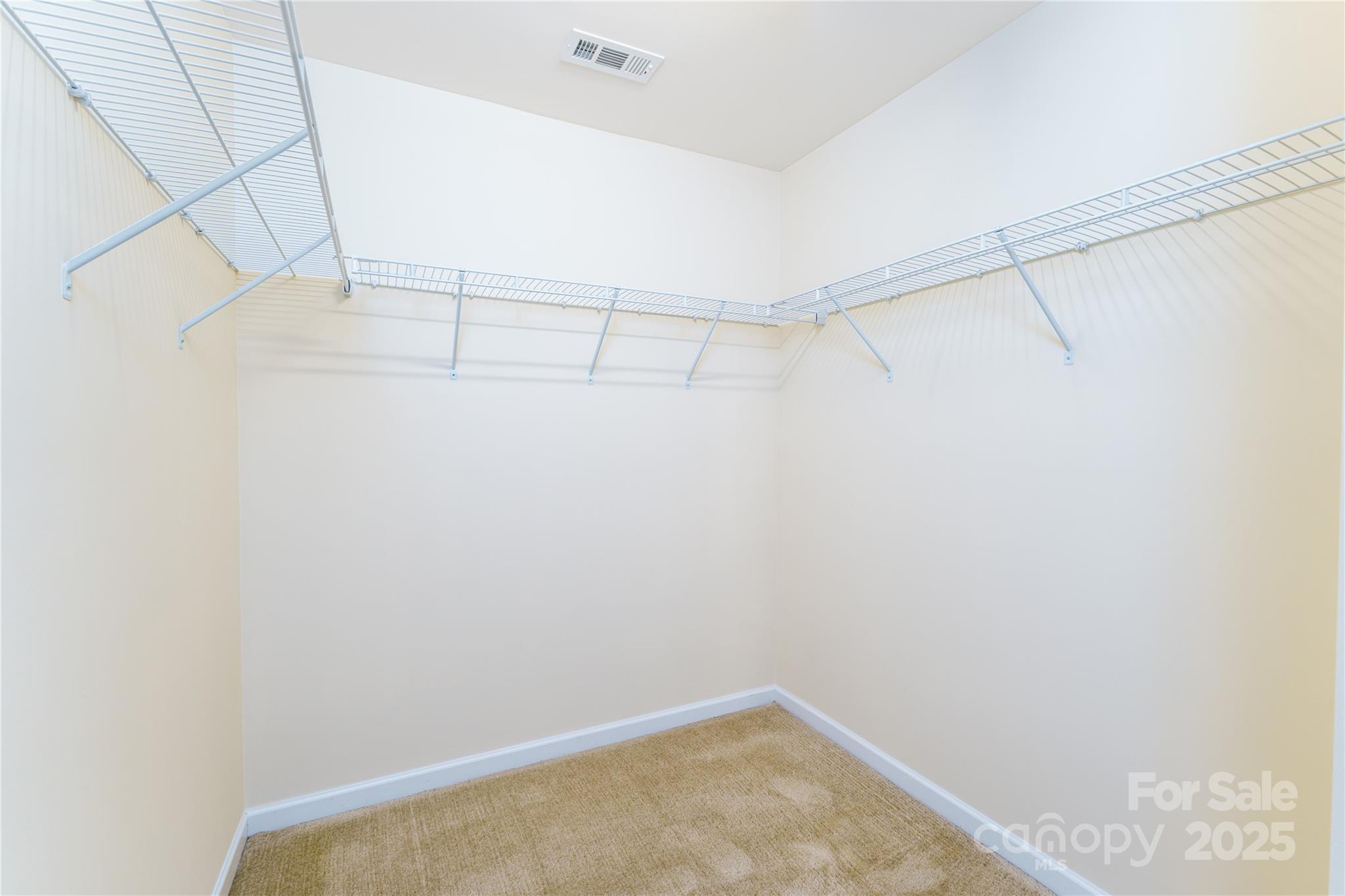 162 Limerick Road, Unit C Mooresville, NC 28115 - Photo 23 of 45 a view of a room with racks on the wall