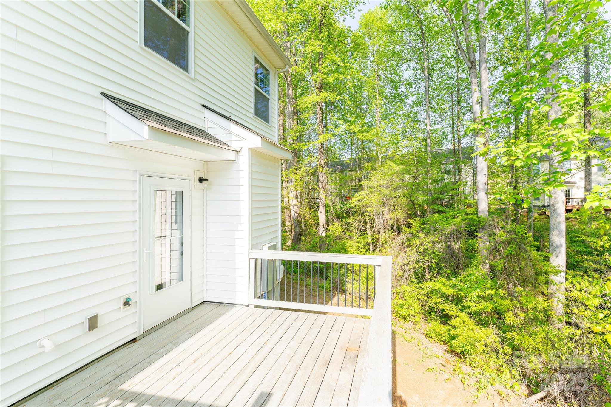 162 Limerick Road, Unit C Mooresville, NC 28115 - Photo 30 of 45 a view of a balcony with wooden floor and fence