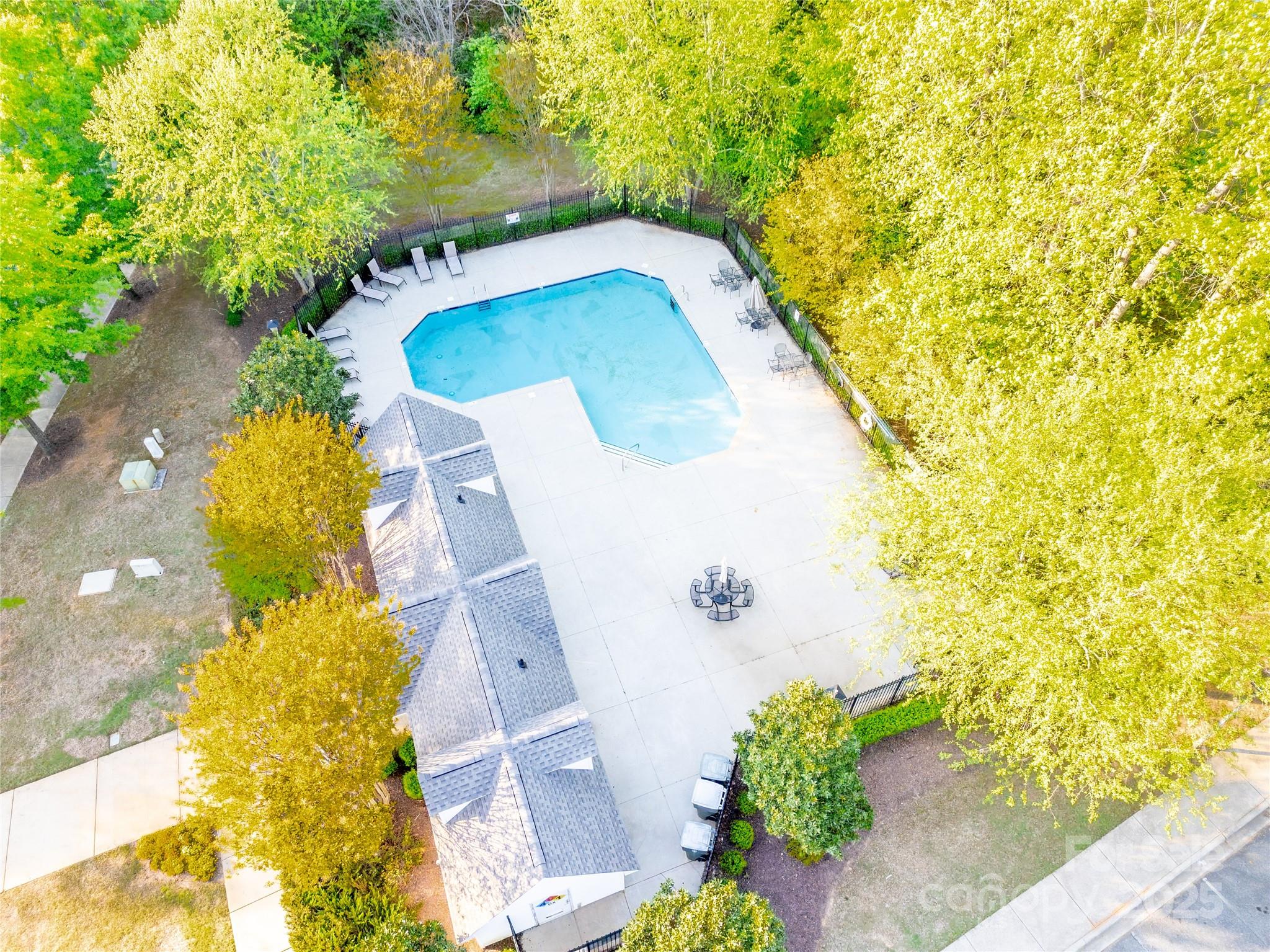 162 Limerick Road, Unit C Mooresville, NC 28115 - Photo 44 of 45 a view of a swimming pool with a yard