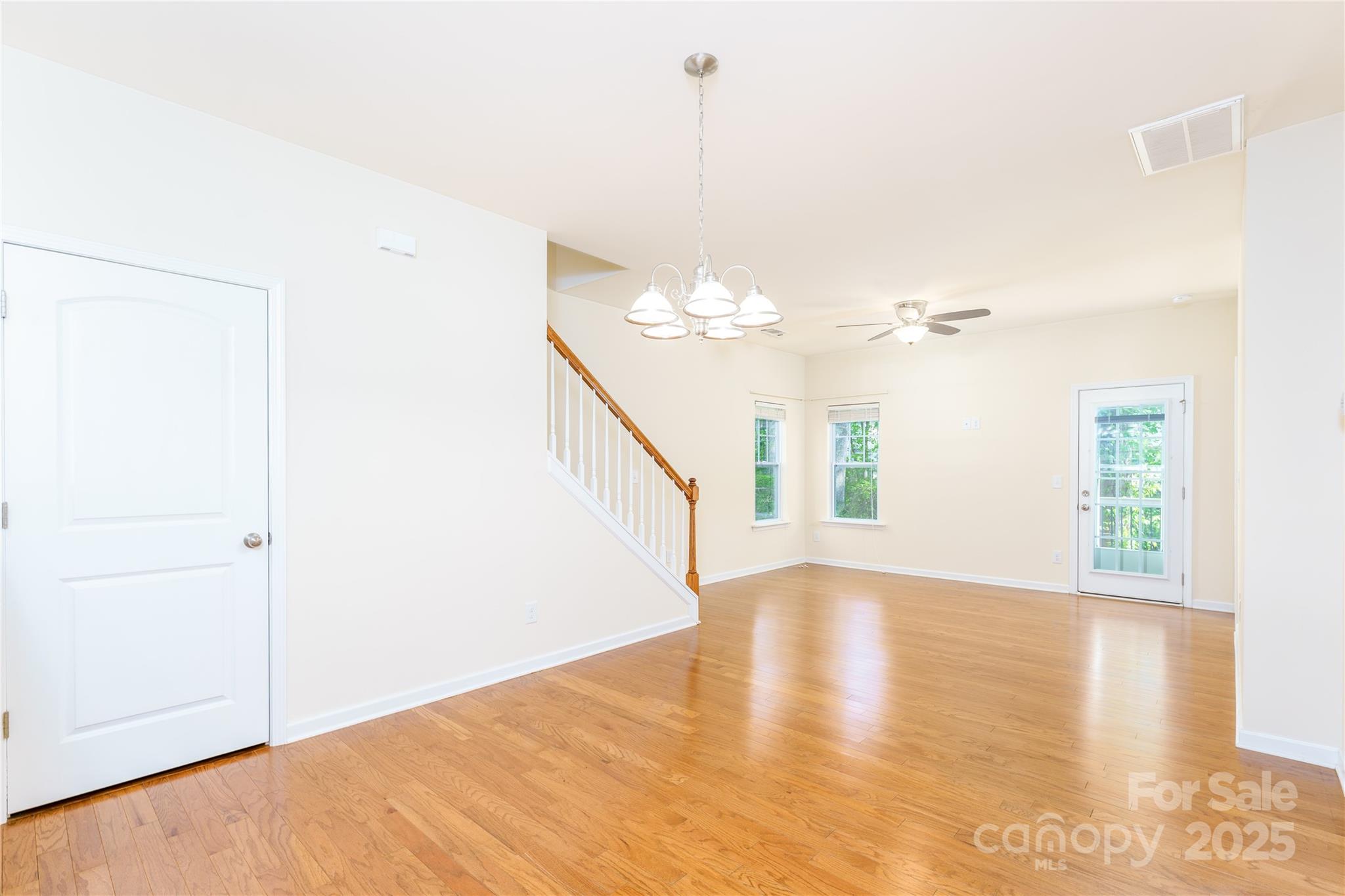 162 Limerick Road, Unit C Mooresville, NC 28115 - Photo 7 of 45 a view of a room with wooden floor and white walls