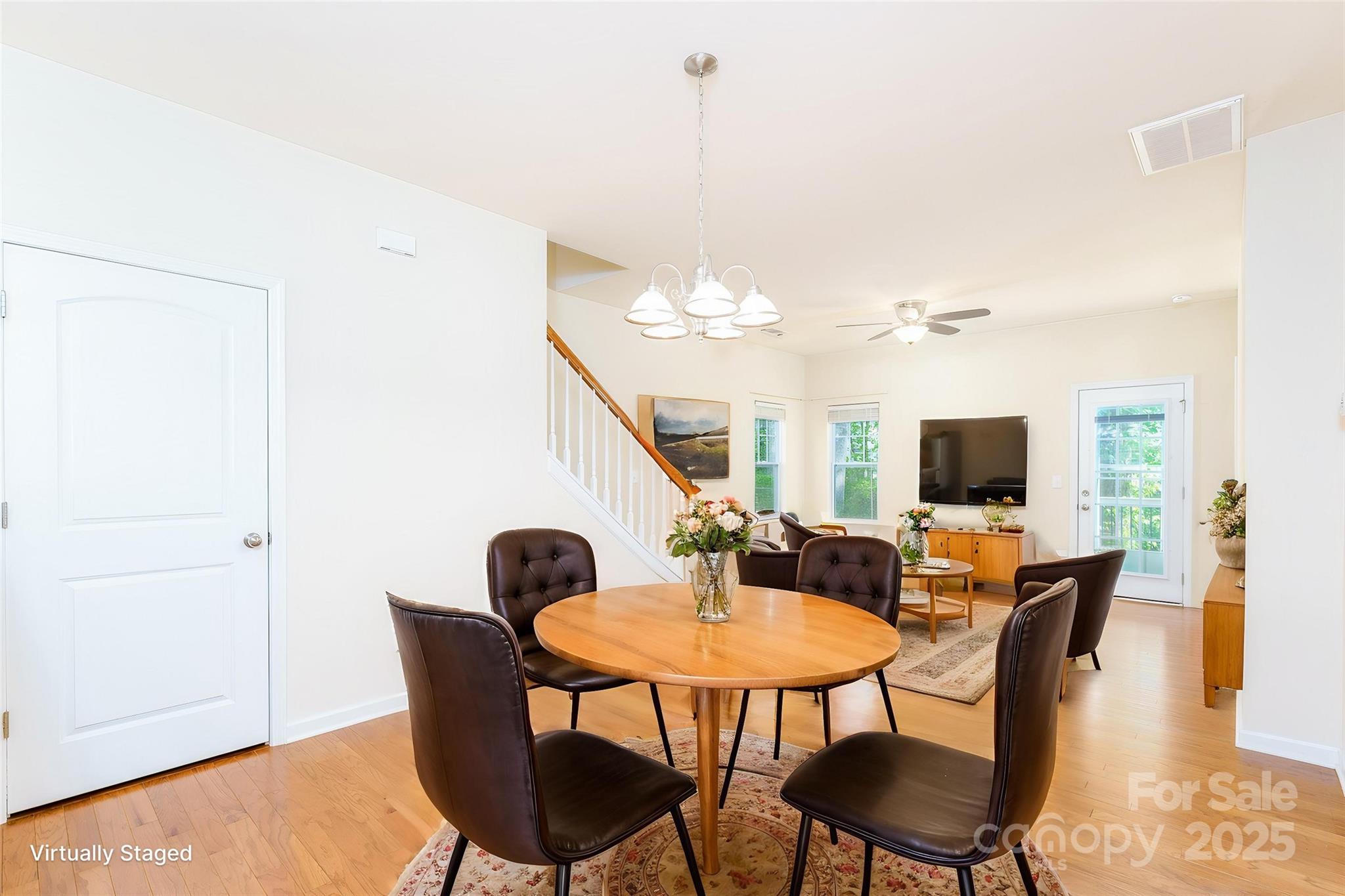 162 Limerick Road, Unit C Mooresville, NC 28115 - Photo 8 of 45 a view of a dining room with furniture and wooden floor