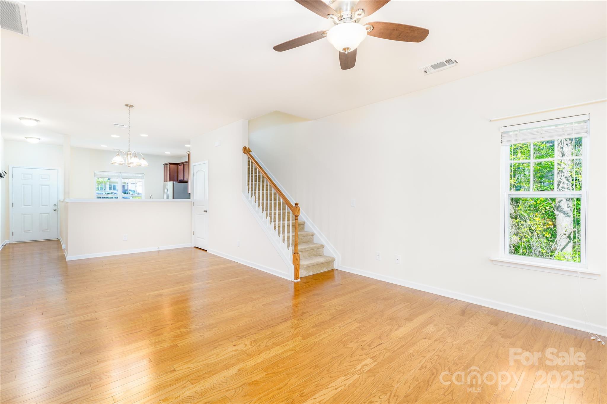 162 Limerick Road, Unit C Mooresville, NC 28115 - Photo 9 of 45 a view of an empty room with a window