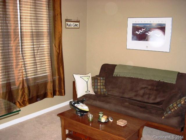 923 Lyndley Drive, Unit 75 Fort Mill, SC 29708 - Photo 5 of 12 a living room with furniture and a window