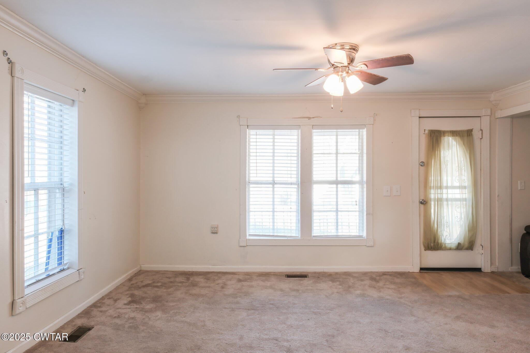 305 Phelps Street Gleason, TN 38229 - Photo 15 of 28 a view of an empty room with a window