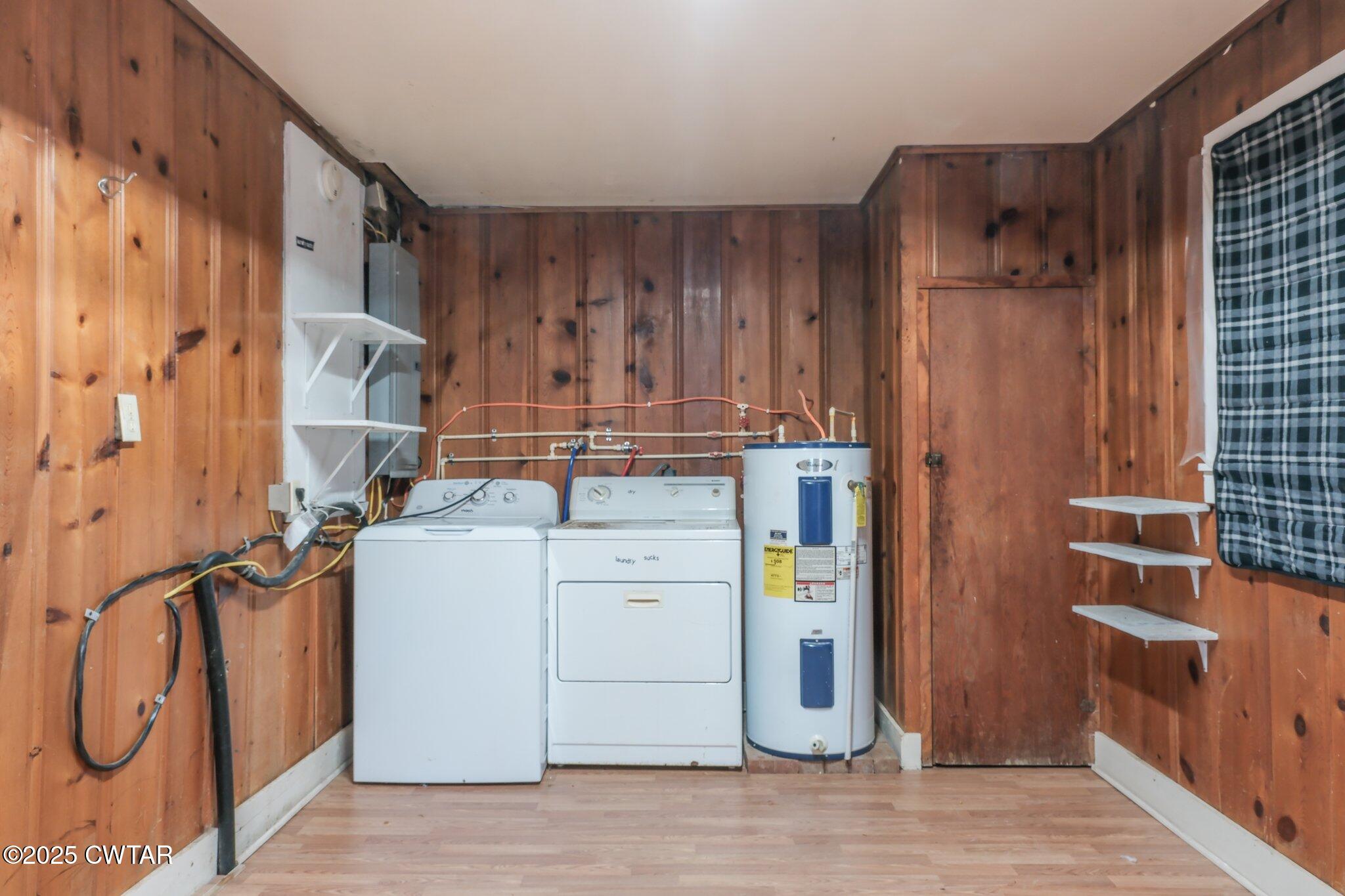 305 Phelps Street Gleason, TN 38229 - Photo 24 of 28 a utility room with cabinets