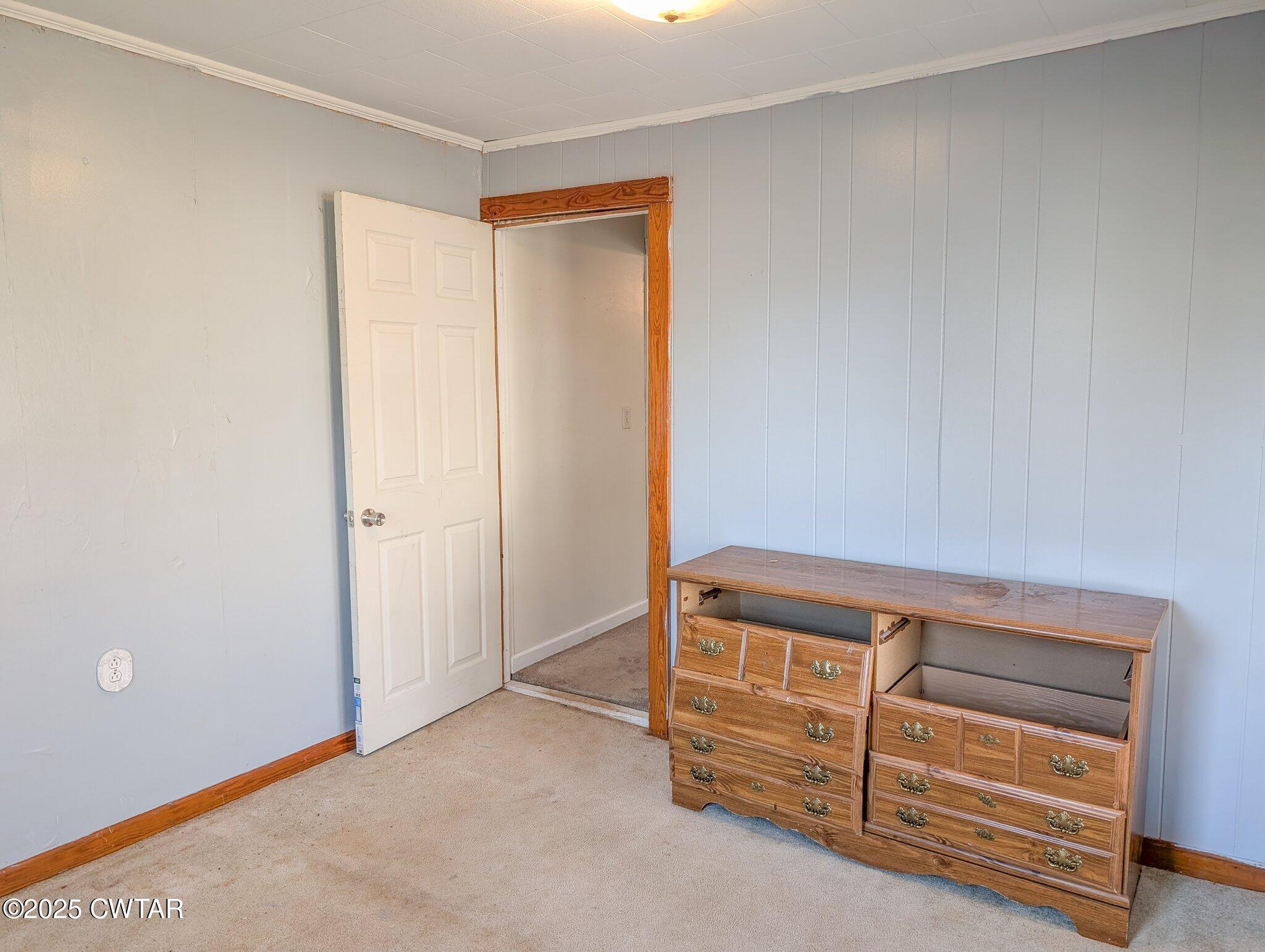 305 Phelps Street Gleason, TN 38229 - Photo 27 of 28 a view of room with stairs