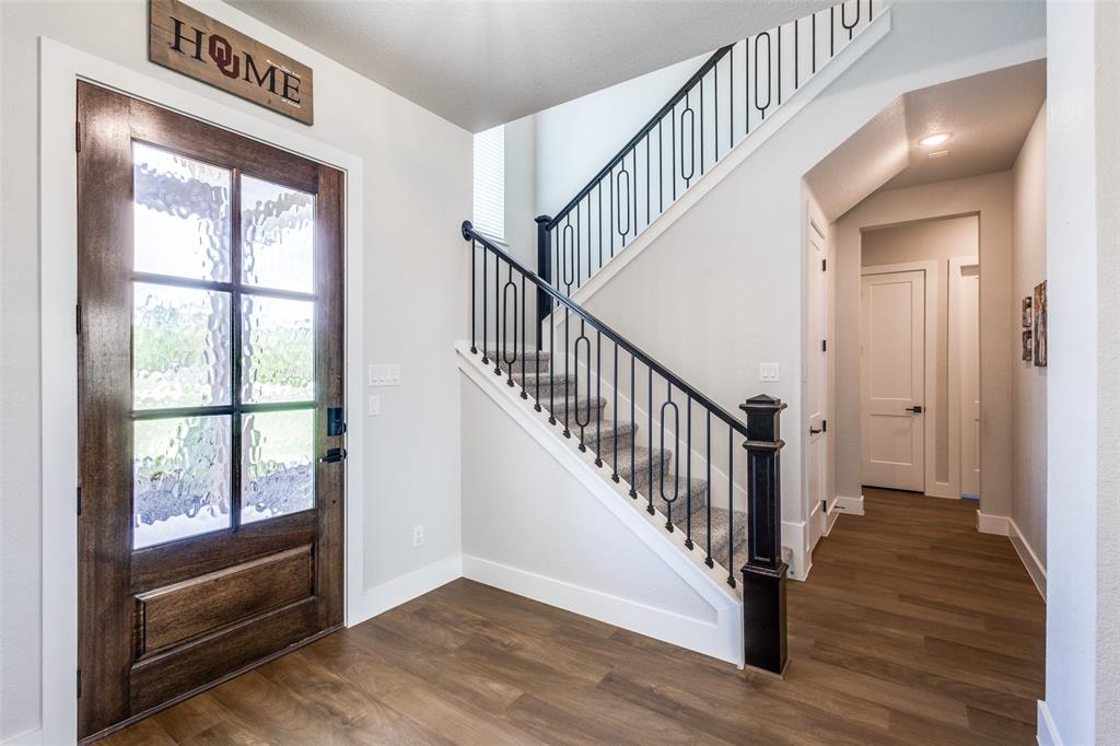 2255 County Road 377 Van Alstyne, TX 75495 - Photo 3 of 35 a view of entryway with wooden floor and stairs