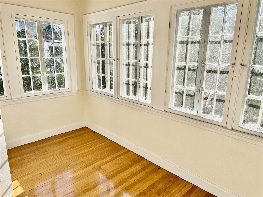 12 Cloelia Terrace, Unit 12 Newton, MA 02460 - Photo 5 of 9 a view of an empty room with a window