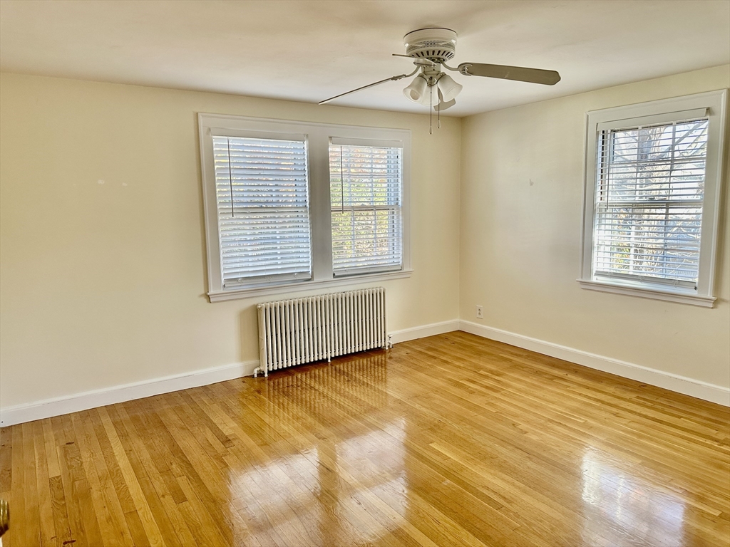 12 Cloelia Terrace, Unit 12 Newton, MA 02460 - Photo 7 of 9 a view of an empty room with a window