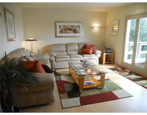 588 McKee Road Washington, PA 15301 - Photo 5 of 18 Living Room. living room with pergo floors, french doors leading to deck with great views