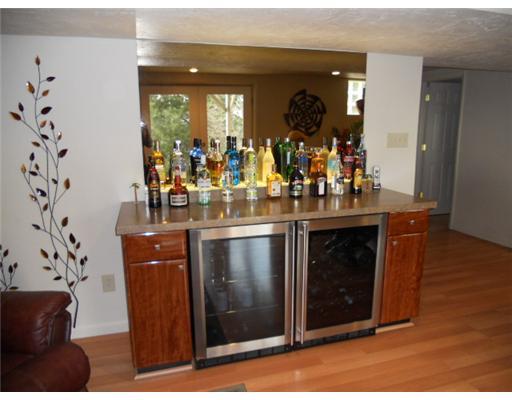 588 McKee Road Washington, PA 15301 - Photo 7 of 18 Den/Family/Great Room. another view of the family room with built in bar and refrigerator,
