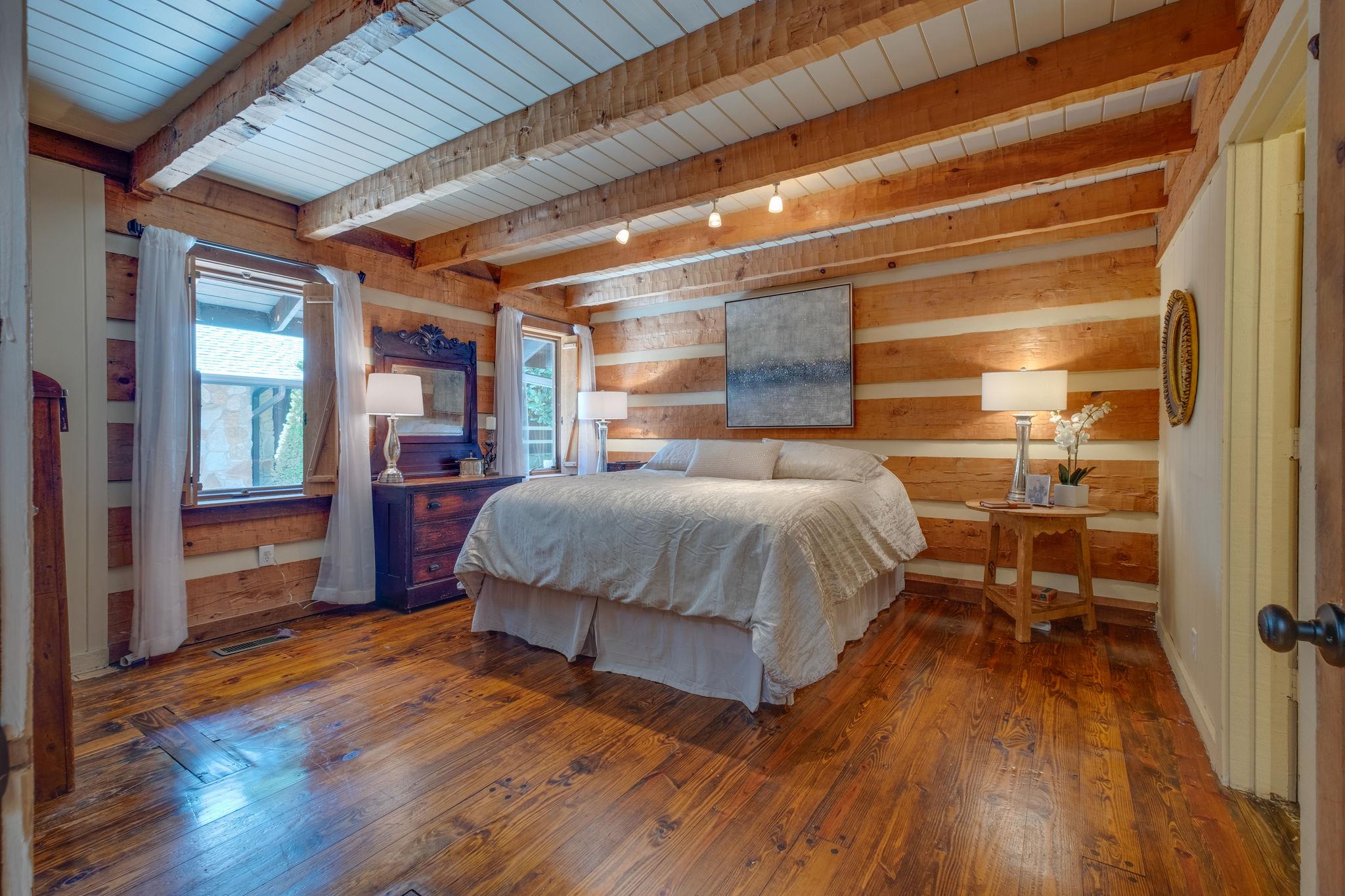 3360 Sweeney Hollow Road Franklin, TN 37064 - Photo 12 of 30 a bedroom with a bed and a wooden floor