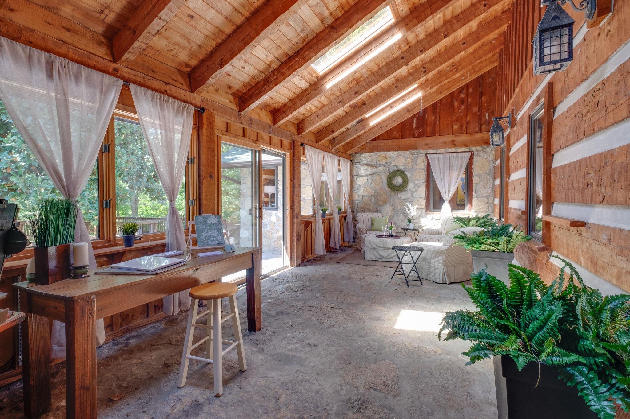 3360 Sweeney Hollow Road Franklin, TN 37064 - Photo 21 of 30 a dining room with furniture and a garden