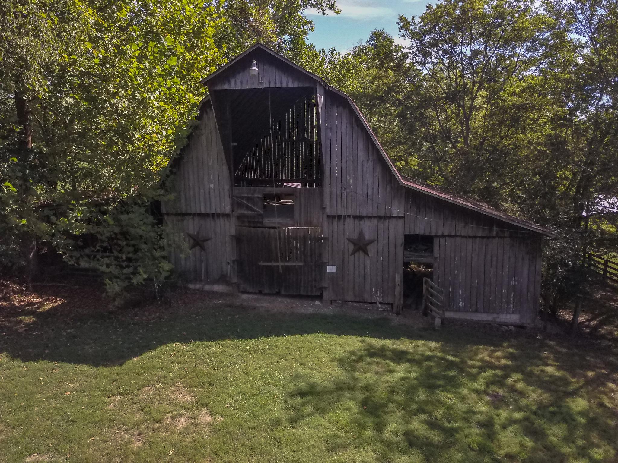 3360 Sweeney Hollow Road Franklin, TN 37064 - Photo 27 of 30 a backyard of a house with lots of green space