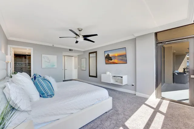 a bathroom with a double vanity sink toilet and a mirror