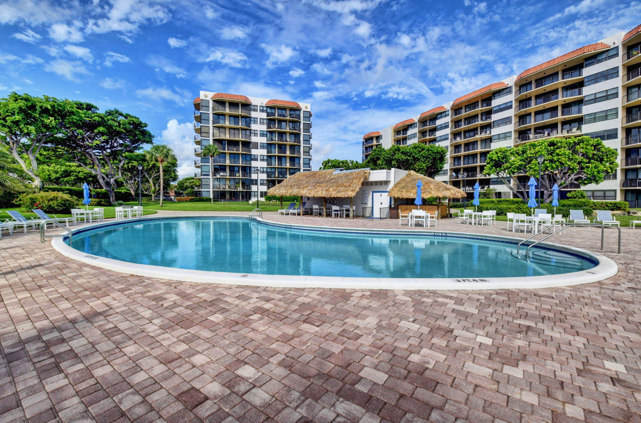 859 Jeffery Street, Unit 7030 Boca Raton, FL 33487 - Photo 31 of 53 a view of pool with outdoor seating
