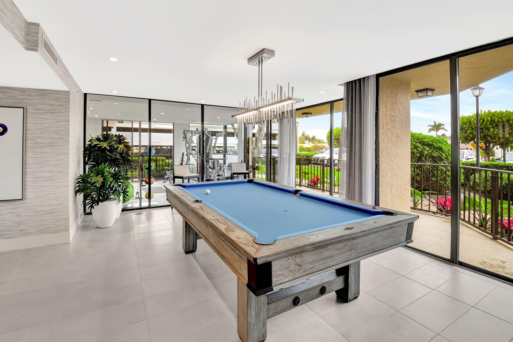 859 Jeffery Street, Unit 7030 Boca Raton, FL 33487 - Photo 41 of 53 a room with pool table and windows