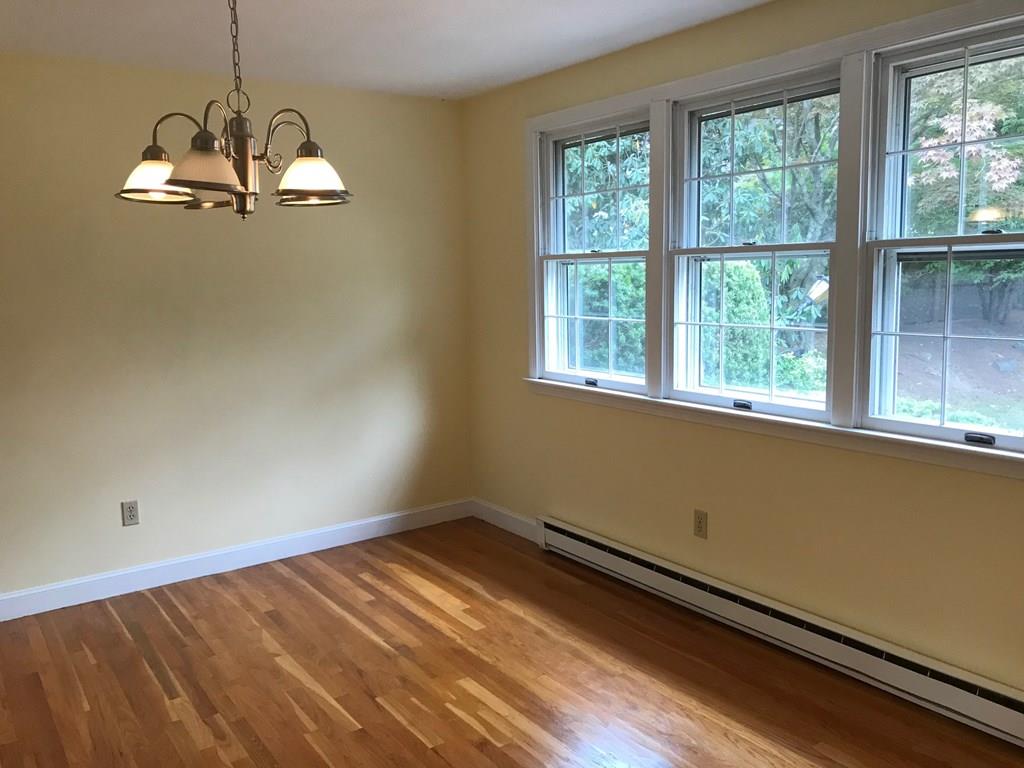 8 Idylwilde Road Lexington, MA 02421 - Photo 11 of 27 a view of a room with wooden floor and windows