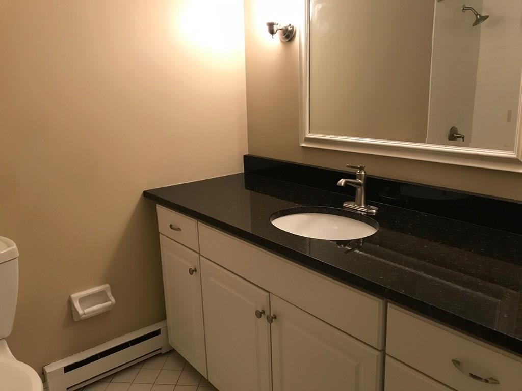 8 Idylwilde Road Lexington, MA 02421 - Photo 14 of 27 a bathroom with a sink and a mirror