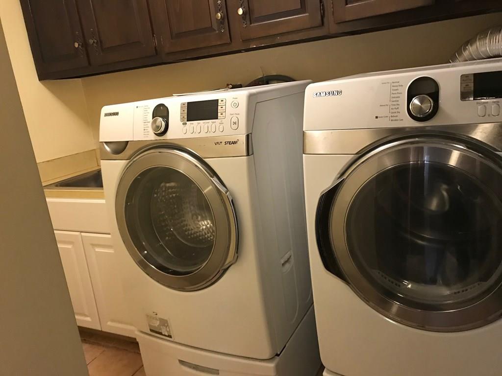8 Idylwilde Road Lexington, MA 02421 - Photo 26 of 27 a utility room with dryer and washer