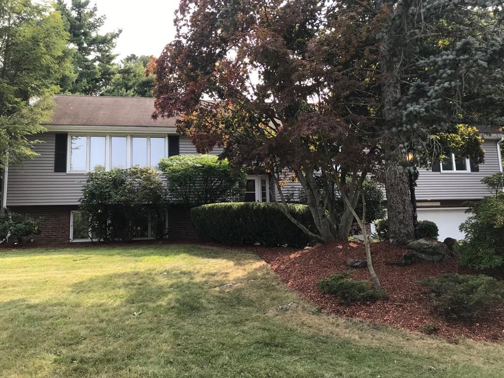 8 Idylwilde Road Lexington, MA 02421 - Photo 3 of 27 a view of a house with swimming pool and sitting area