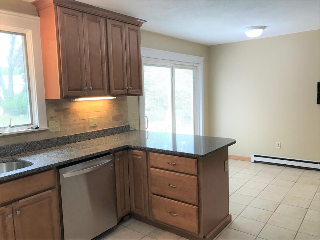 8 Idylwilde Road Lexington, MA 02421 - Photo 10 of 27 a kitchen with cabinets appliances and a window