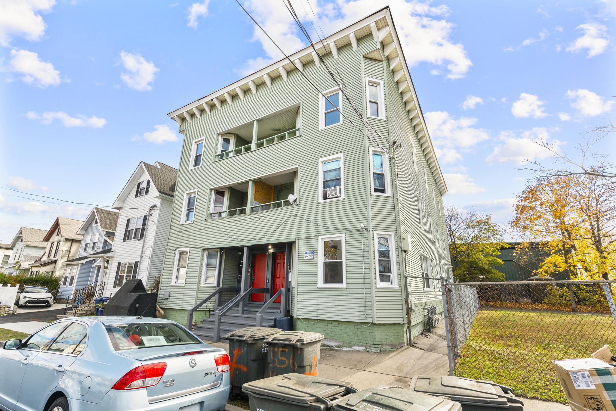 746 Maple Street Bridgeport, CT 06608 - Photo 3 of 38 a front view of a building with street view