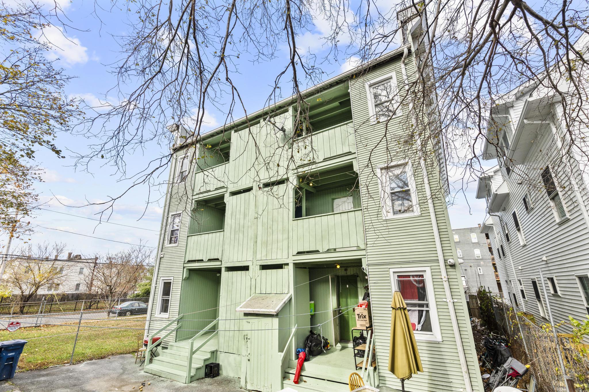 746 Maple Street Bridgeport, CT 06608 - Photo 6 of 38 a view of a building with a street