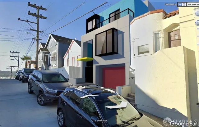a bedroom with furniture and a flat screen tv