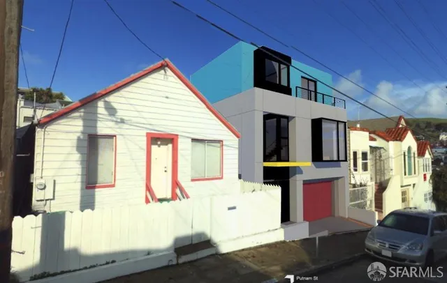 a view of living room kitchen with furniture and window