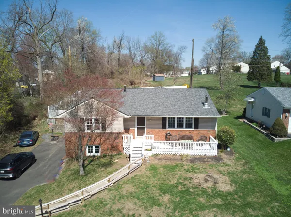 an aerial view of a house with garden
