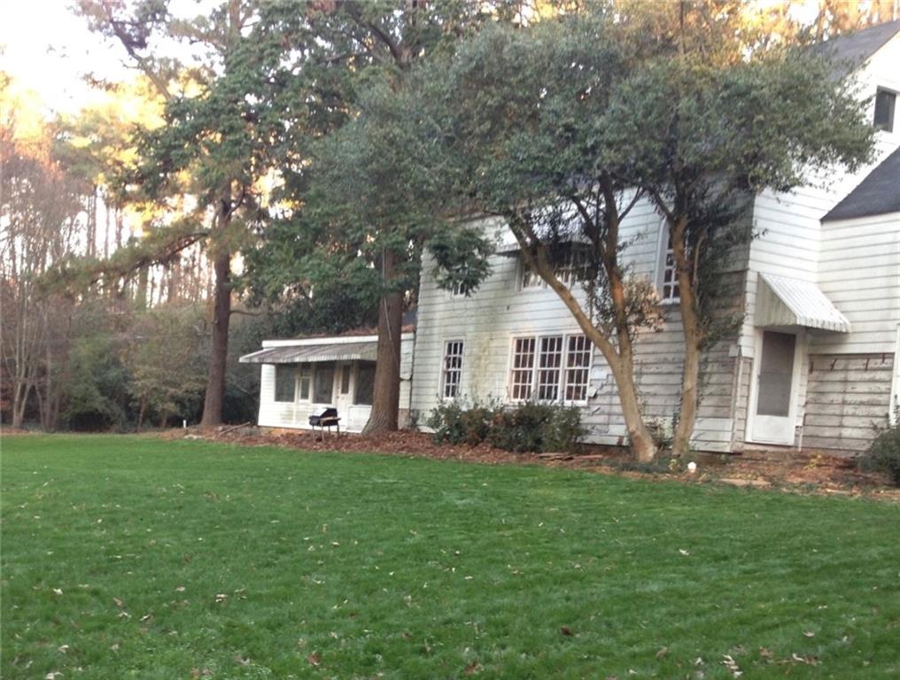 550 South Rays Road Stone Mountain, GA 30083 - Photo 13 of 18 a front view of house with yard and green space