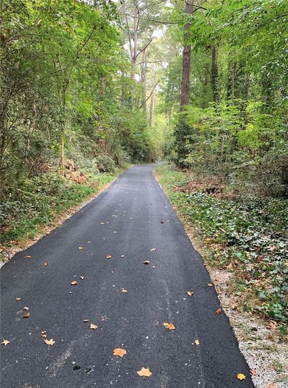 550 South Rays Road Stone Mountain, GA 30083 - Photo 10 of 18 a view of a pathway both side of yard
