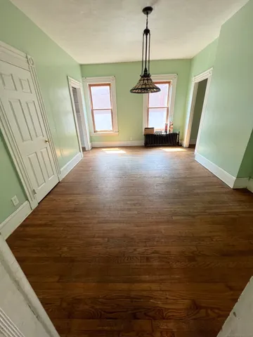 a view of empty room with windows