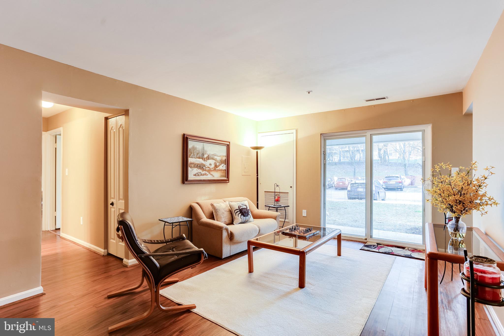 8611 Falls Run Road, Unit D Ellicott City, MD 21043 - Photo 14 of 32 Plenty of natural light. Slider w/built in blinds